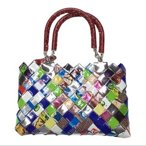 Nahui Ollin Arm Candy Wrapper purse.
